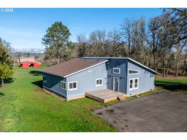 a house view with a garden space