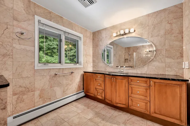 a view of a sink and a mirror