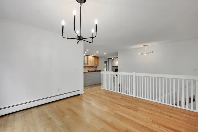 a view of a kitchen with a sink and dishwasher