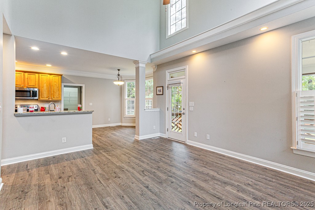 367 Falling Water Road Spring Lake, NC 28390 - Photo 13 of 41 a view of a kitchen cabinets and a wooden floor