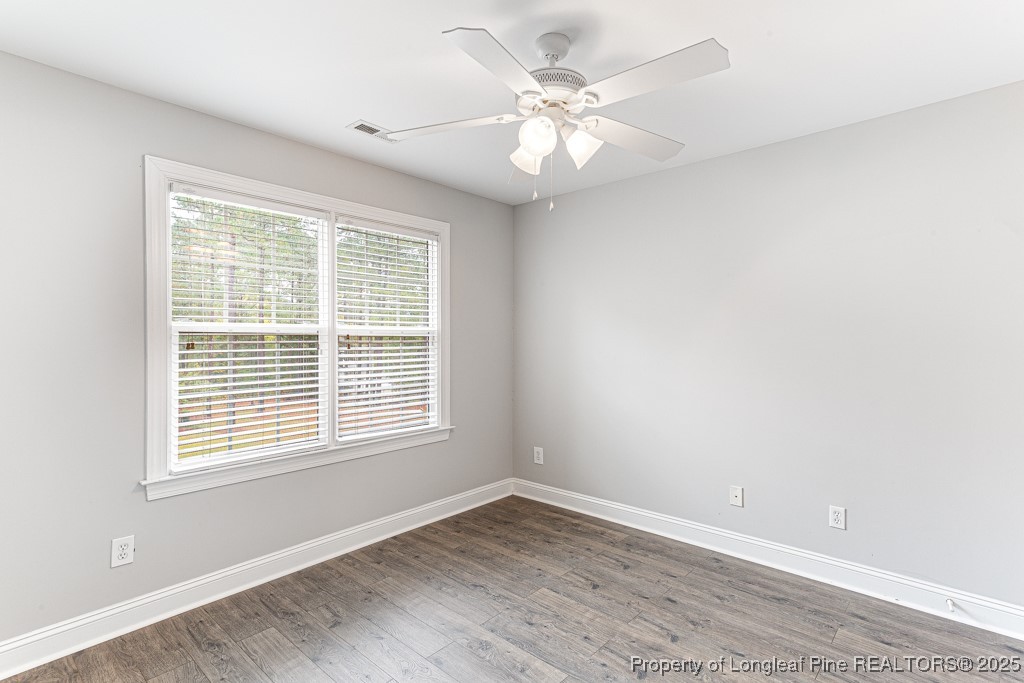 367 Falling Water Road Spring Lake, NC 28390 - Photo 21 of 41 a view of an empty room with a window