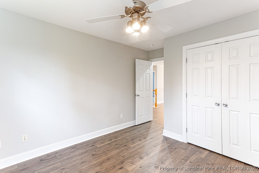 367 Falling Water Road Spring Lake, NC 28390 - Photo 27 of 41 wooden floor in an empty room