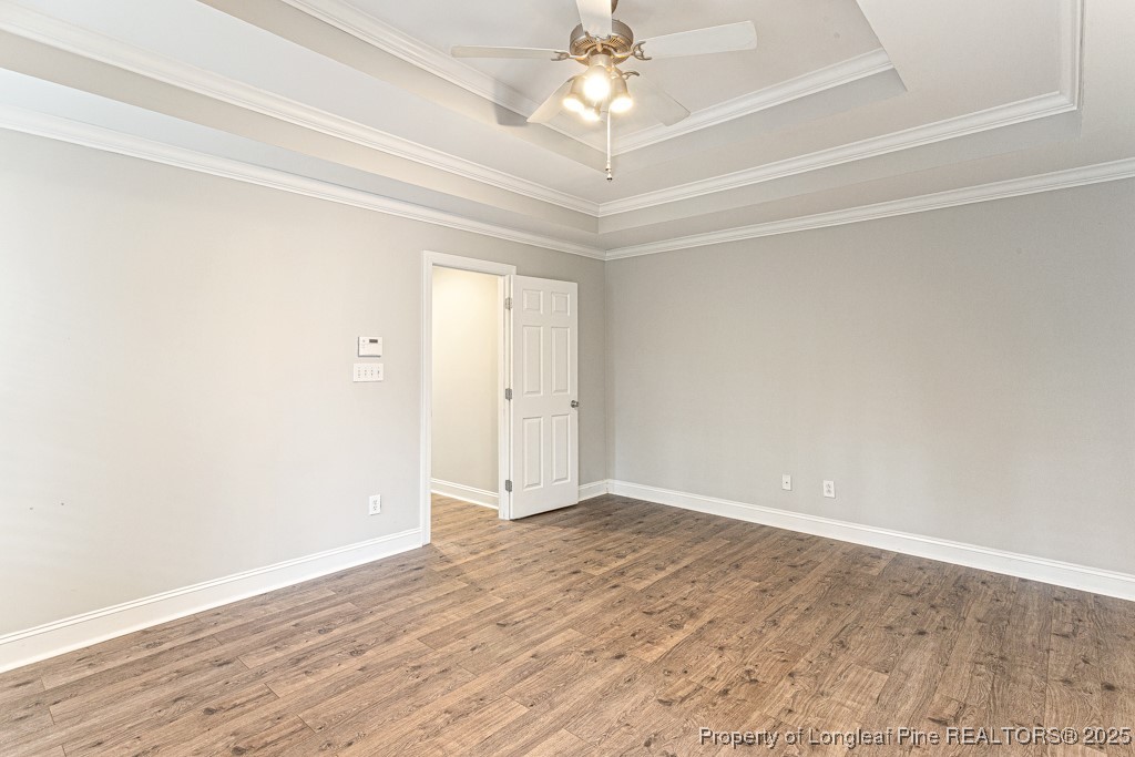 367 Falling Water Road Spring Lake, NC 28390 - Photo 29 of 41 a view of an empty room with wooden floor