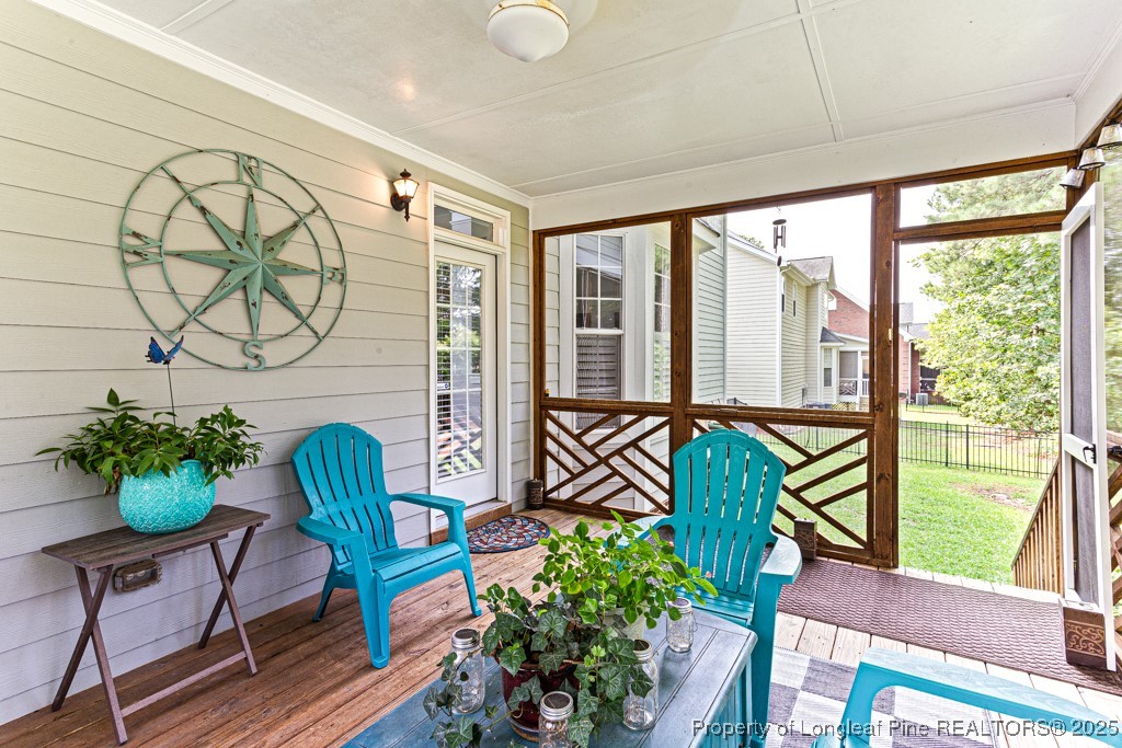 367 Falling Water Road Spring Lake, NC 28390 - Photo 35 of 41 a living room filled with furniture and a potted plant