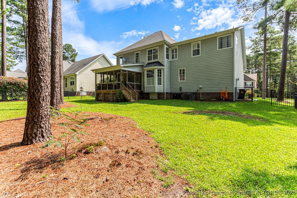 367 Falling Water Road Spring Lake, NC 28390 - Photo 37 of 41 a front view of a house with garden
