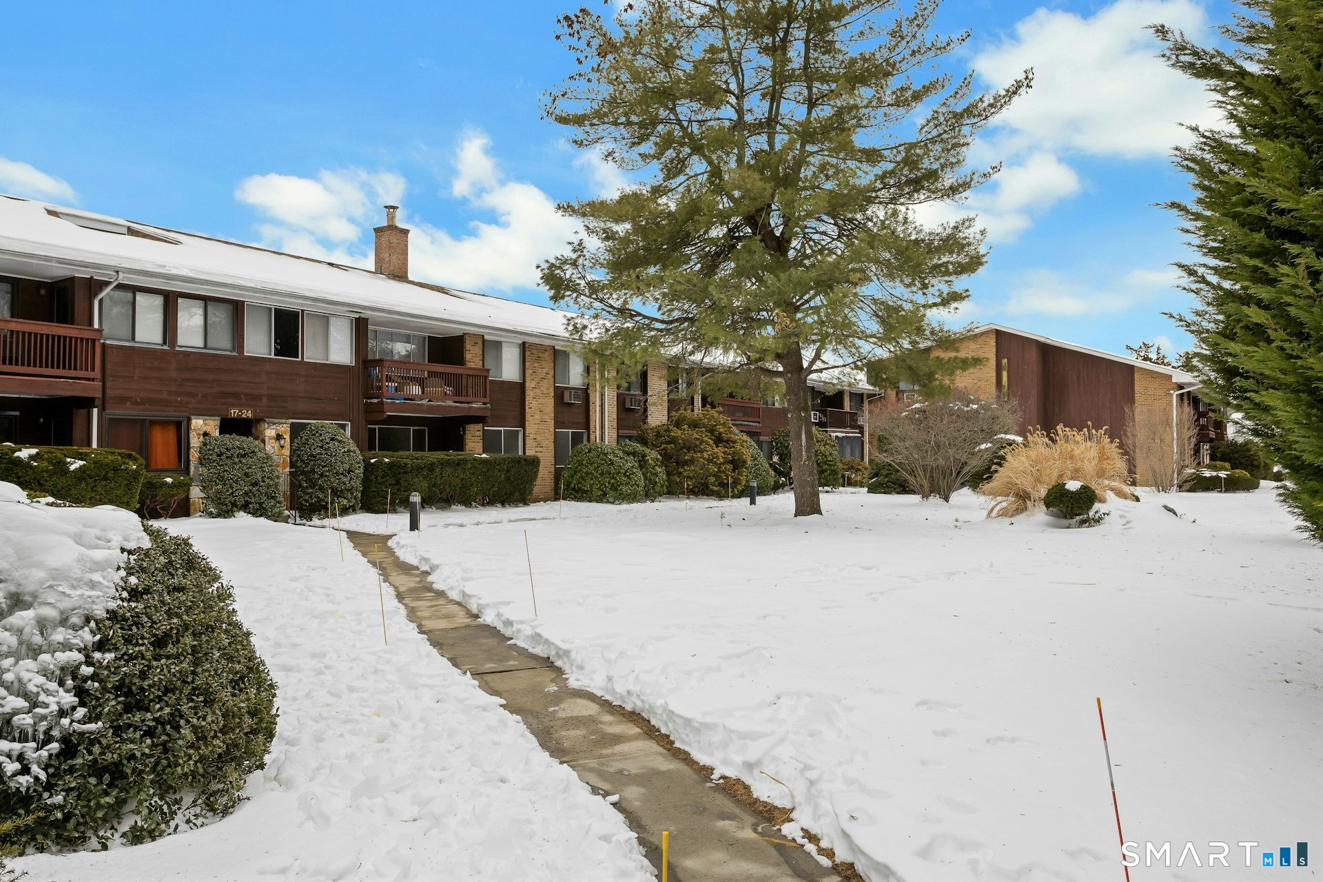 154 Cold Spring Road, Unit 18 Stamford, CT 06905 - Photo 26 of 28 a street view with residential house