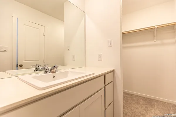 a view of a hallway with closet