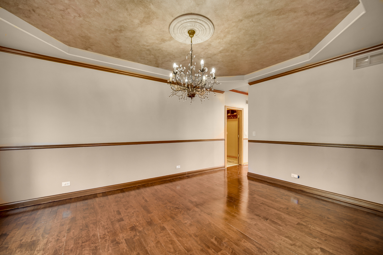 441 Delaware Circle Bolingbrook, IL 60440 - Photo 17 of 69 a view of a room with wooden floor