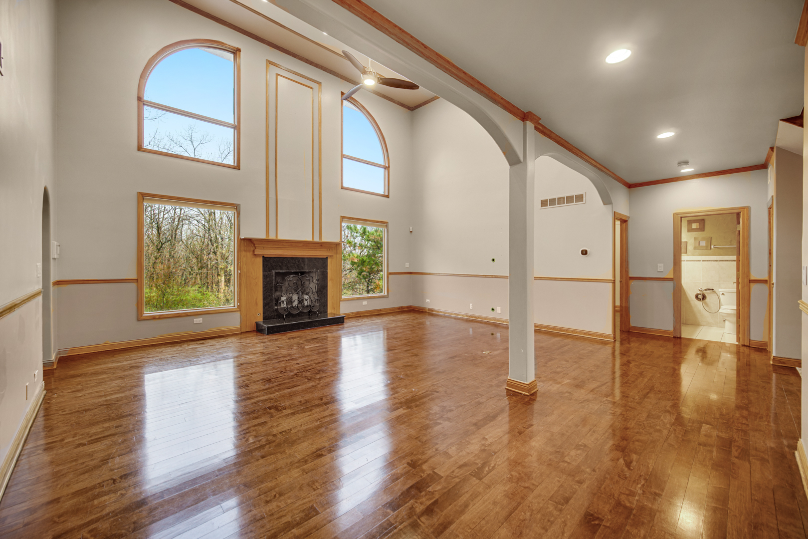 441 Delaware Circle Bolingbrook, IL 60440 - Photo 20 of 69 a view of a livingroom with wooden floor and a fireplace