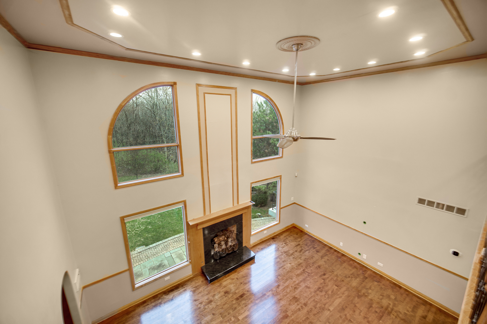 441 Delaware Circle Bolingbrook, IL 60440 - Photo 23 of 69 a view of an empty room with a window and wooden floor
