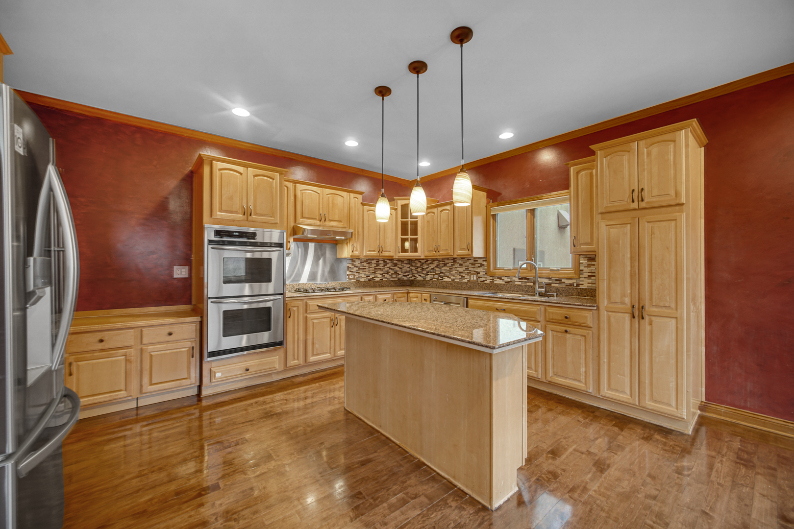 441 Delaware Circle Bolingbrook, IL 60440 - Photo 25 of 69 a kitchen with stainless steel appliances granite countertop a refrigerator a oven and a sink