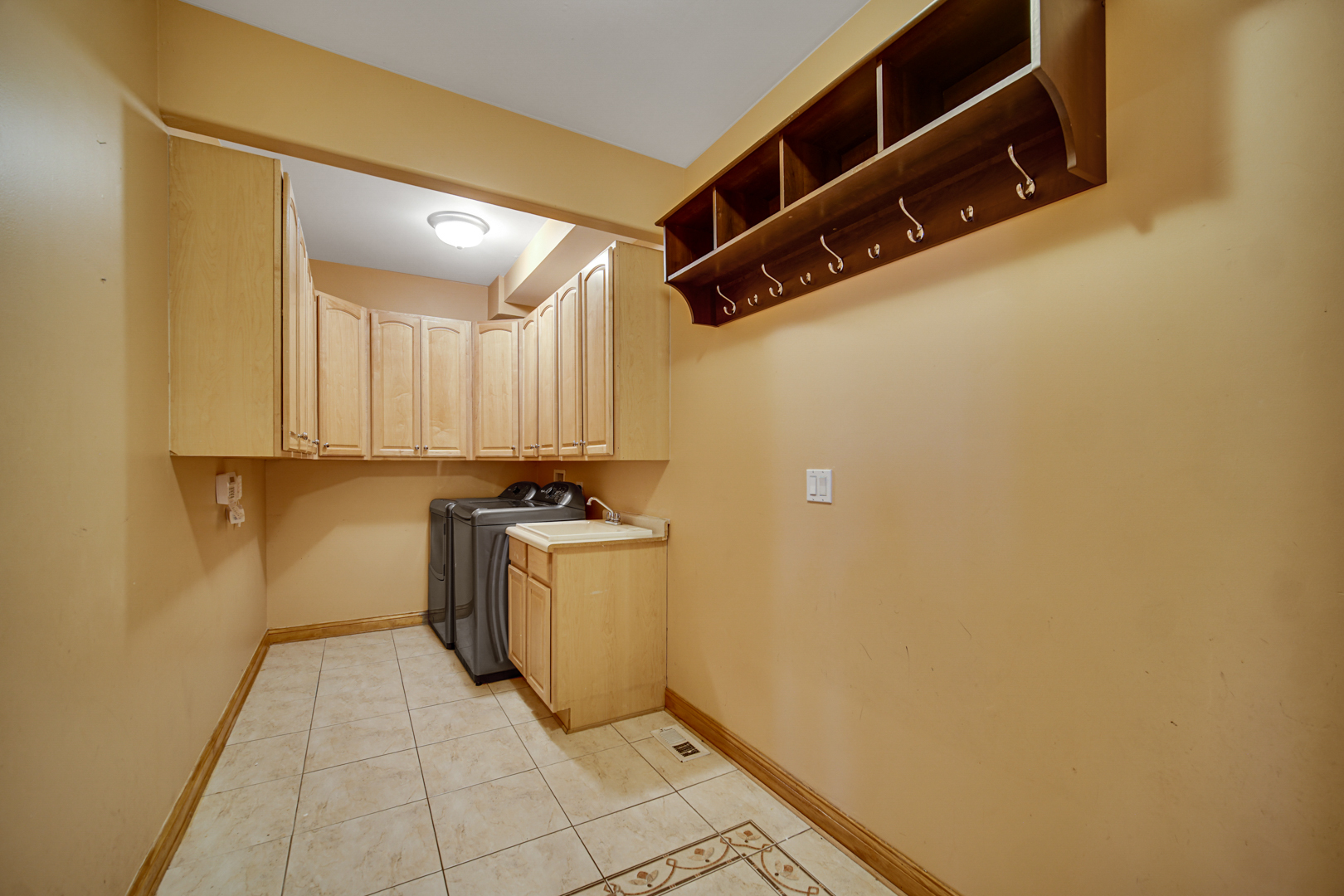 441 Delaware Circle Bolingbrook, IL 60440 - Photo 34 of 69 a view of a storage & utility room with a sink