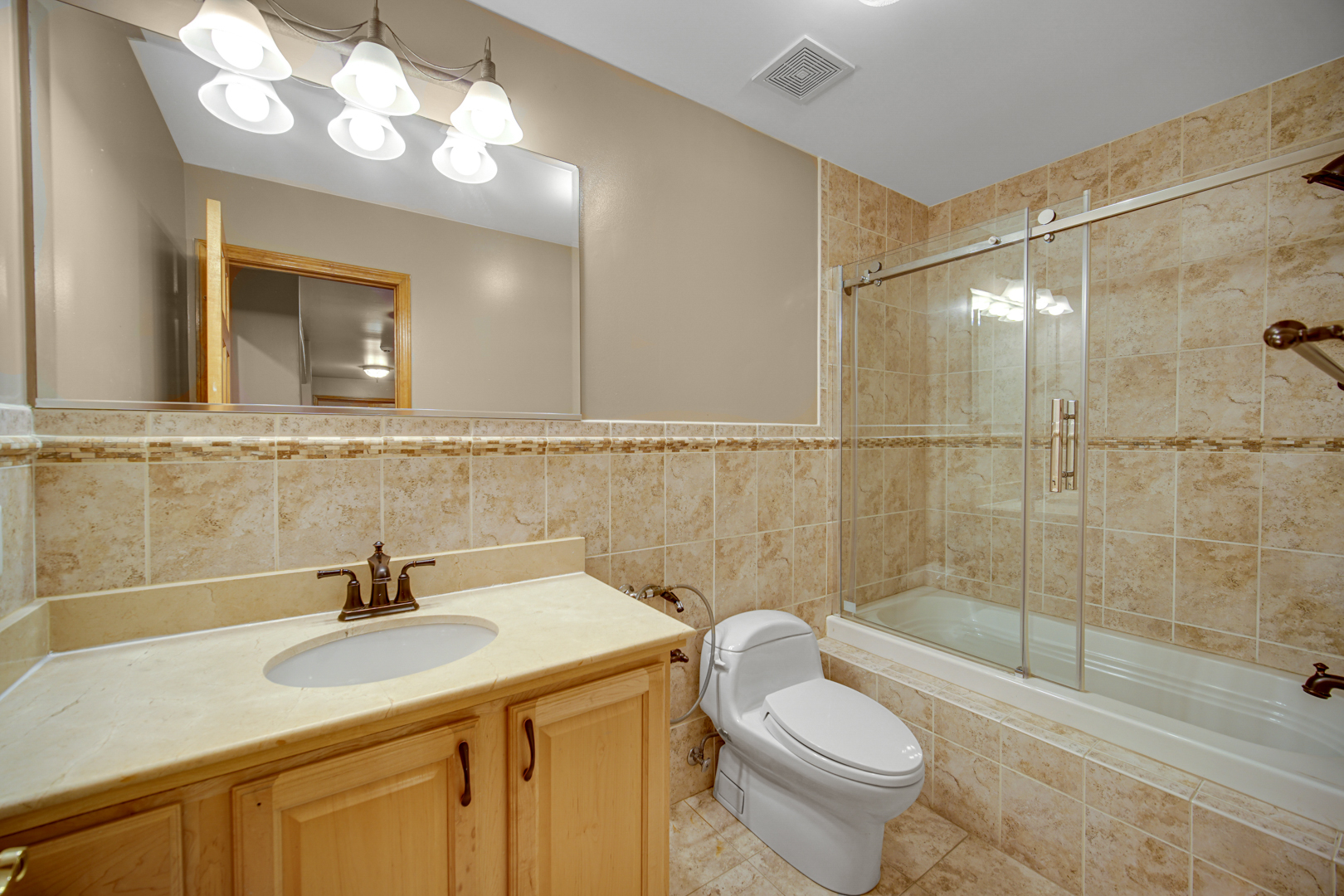 441 Delaware Circle Bolingbrook, IL 60440 - Photo 50 of 69 a bathroom with a sink toilet and shower