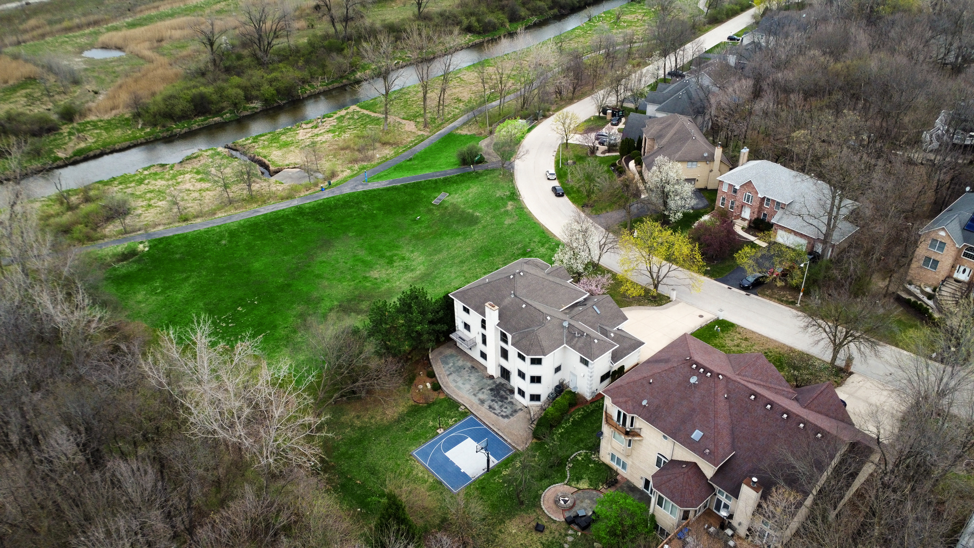 441 Delaware Circle Bolingbrook, IL 60440 - Photo 5 of 69 an aerial view of a house with a garden and lots of trees