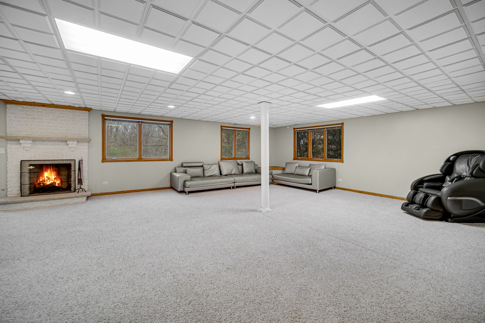 441 Delaware Circle Bolingbrook, IL 60440 - Photo 53 of 69 a view of a livingroom with furniture and a fireplace