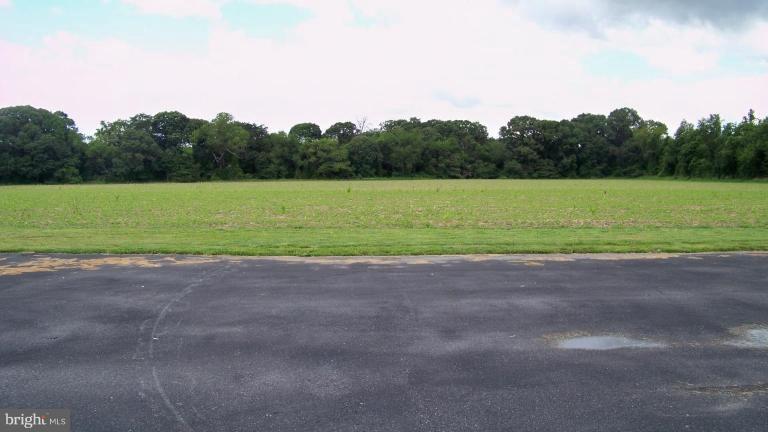 3411 Soper Road Huntingtown, MD 20639 - Photo 17 of 28 a view of a field and grass
