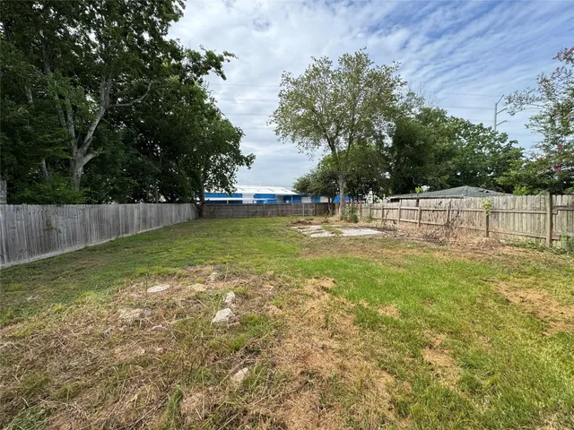 a view of outdoor space with deck and tree