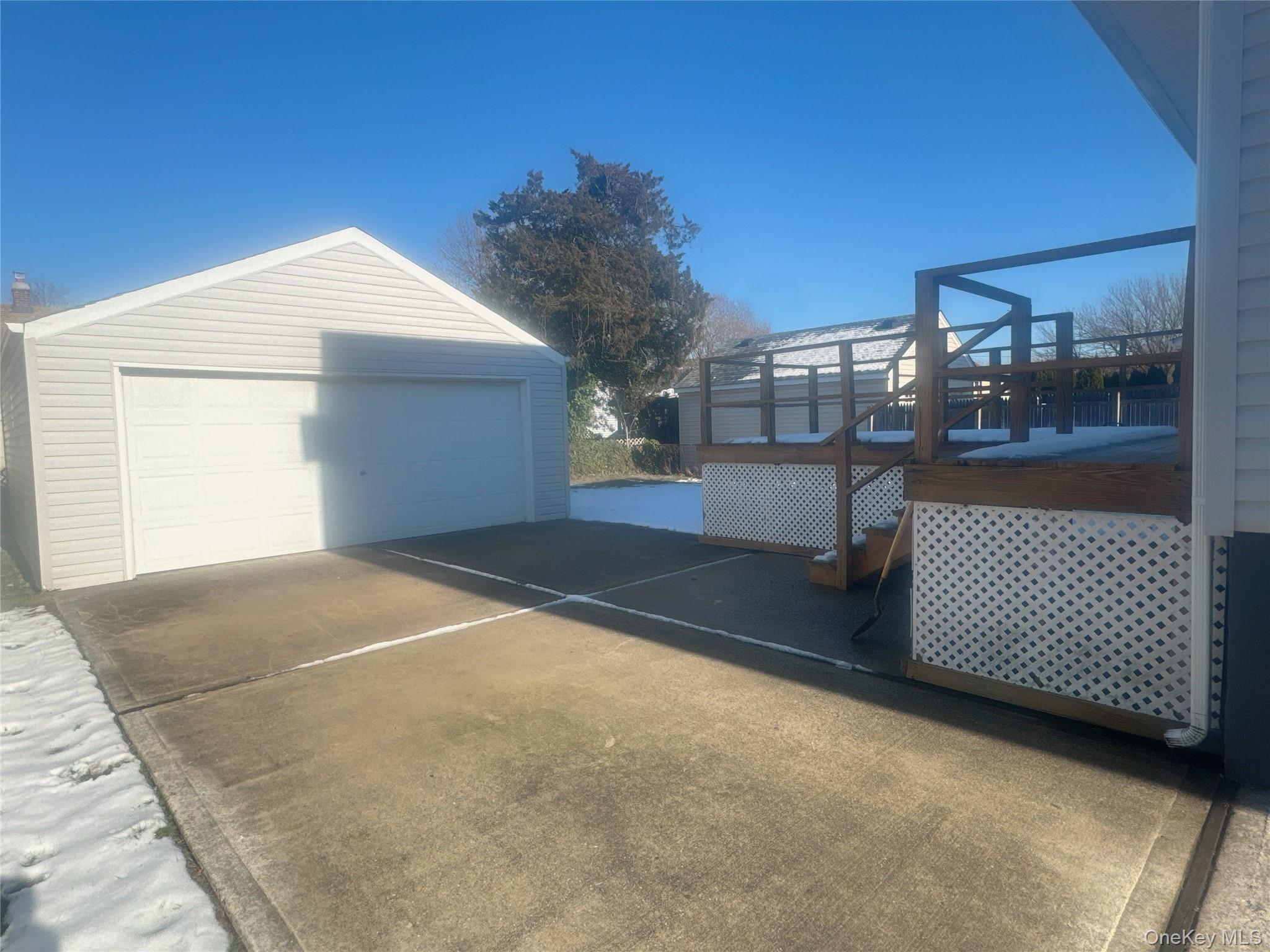 2573 Legion Street Bellmore, NY 11710 - Photo 12 of 13 a view of a house with a backyard