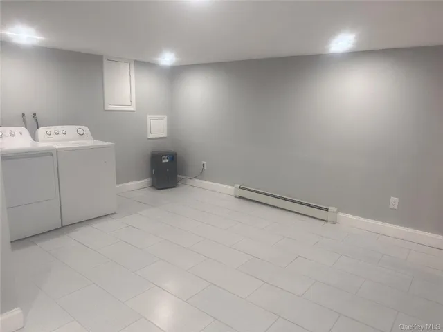 a bathroom with a sink toilet and vanity