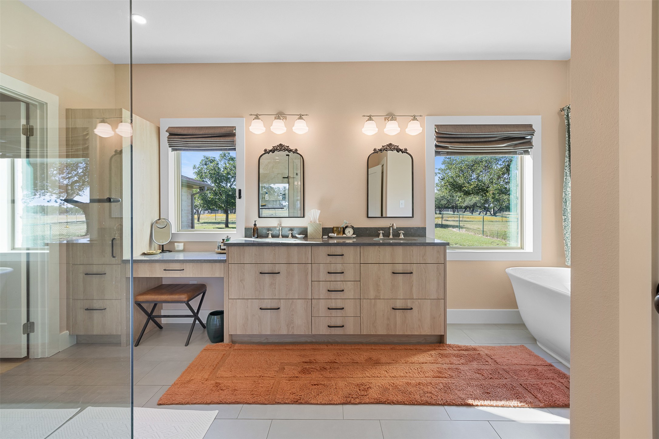 3340 Briggs Road Killeen, TX 76549 - Photo 22 of 40 a spacious bathroom with a granite countertop sink a mirror and a bathtub