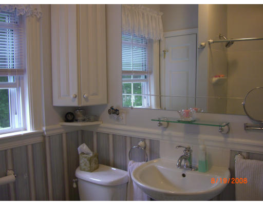 6 Middlesex Avenue Reading, MA 01867 - Photo 4 of 9 a bathroom with a sink and a toilet