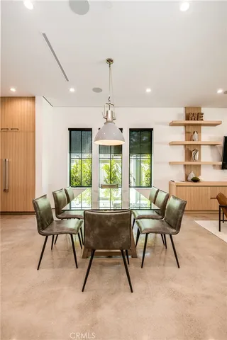 a view of a living room and dining room