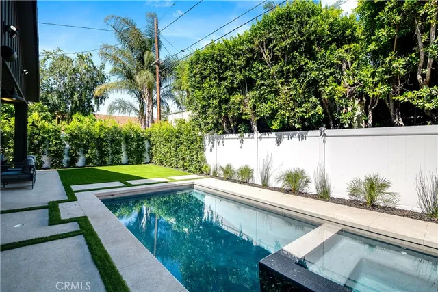 a bathroom with a bathtub and a vanity