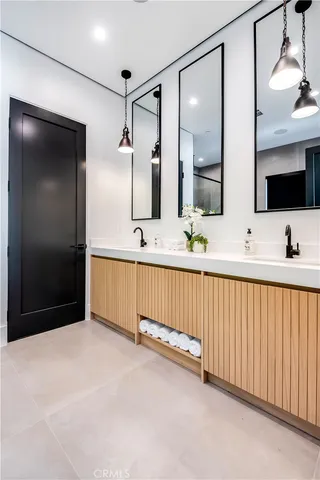 a bathroom with a tub and shower