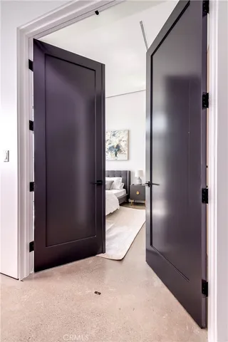 a bathroom with a double vanity sink toilet and shower