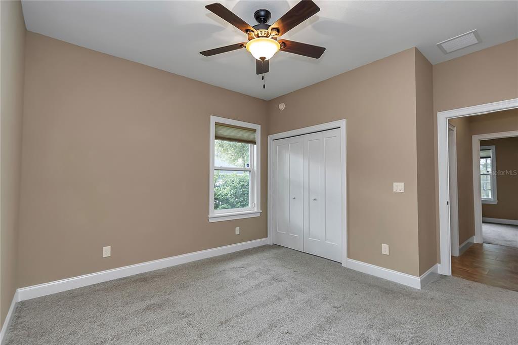4359 Southwest 117th Place Ocala, FL 34476 - Photo 31 of 58 a view of a livingroom with a ceiling fan and window