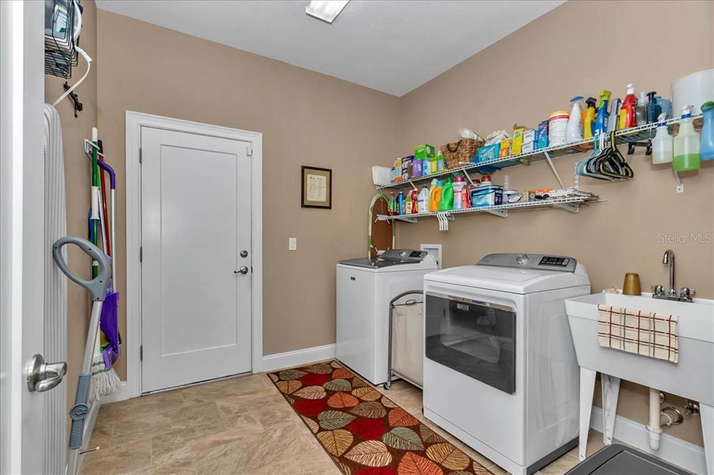 4359 Southwest 117th Place Ocala, FL 34476 - Photo 35 of 58 a utility room with dryer and washer