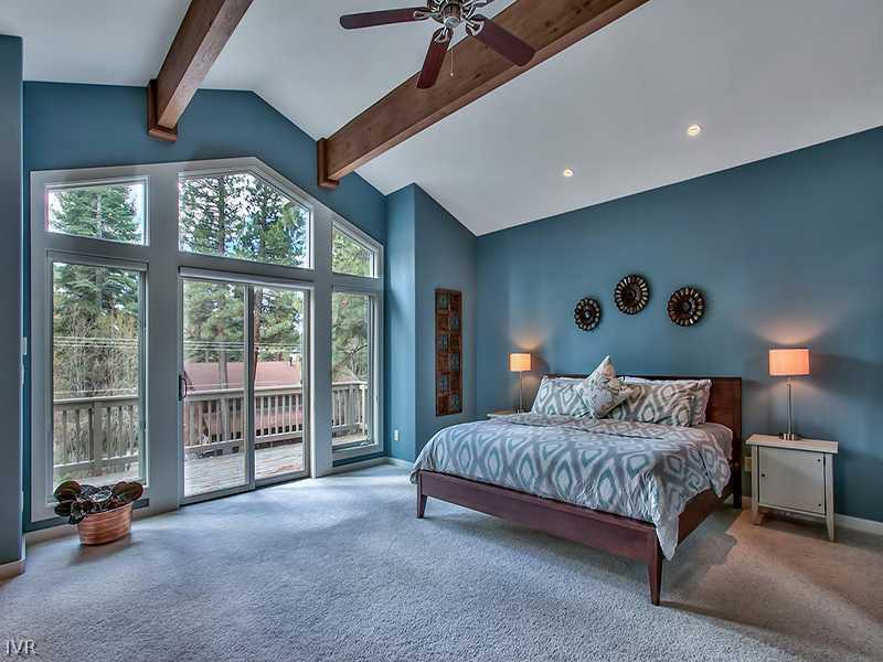 818 Ophir Peak Road Incline Village, NV 89451 - Photo 12 of 31 a bedroom with a bed and a large window