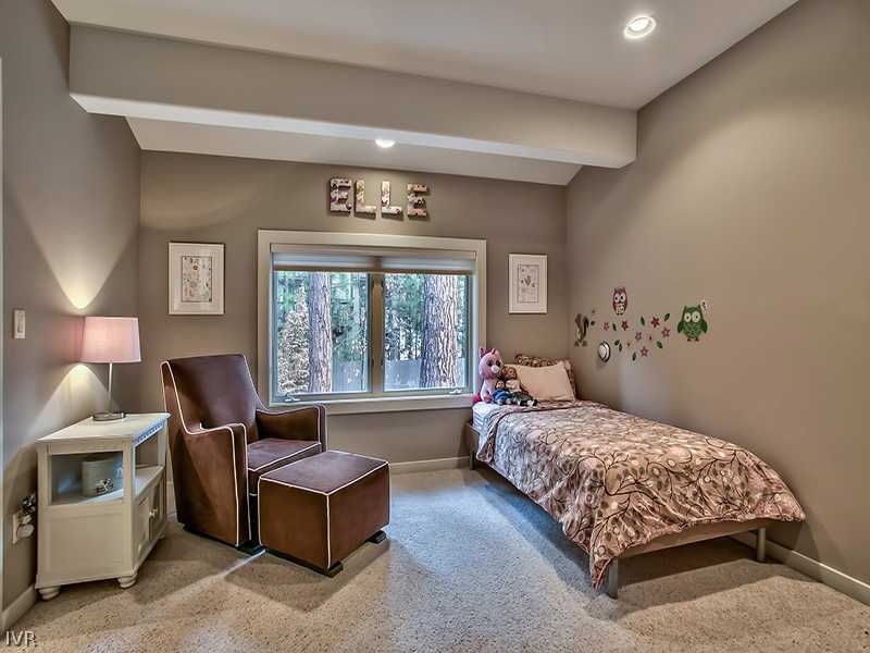 818 Ophir Peak Road Incline Village, NV 89451 - Photo 17 of 31 a bedroom with a bed and large window