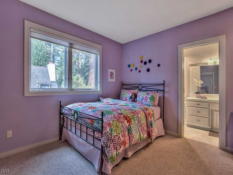 818 Ophir Peak Road Incline Village, NV 89451 - Photo 19 of 31 a bedroom with a bed and a window