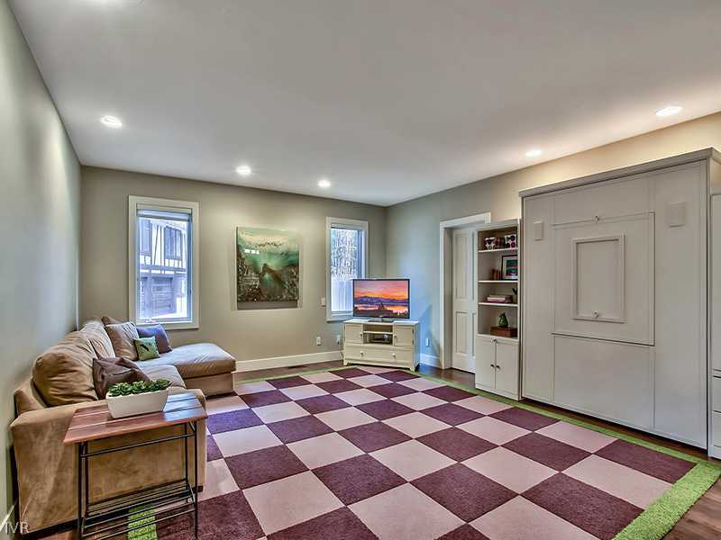 818 Ophir Peak Road Incline Village, NV 89451 - Photo 20 of 31 a living room with furniture and a rug