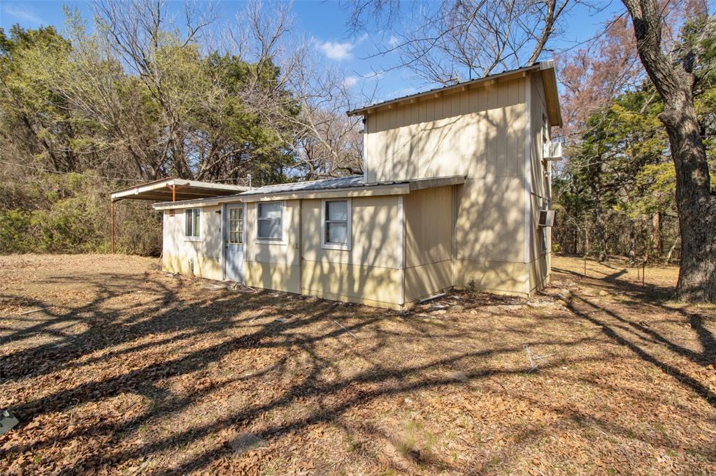 4185 Rock Creek Road Whitesboro, TX 76273 - Photo 13 of 18 View of side of property