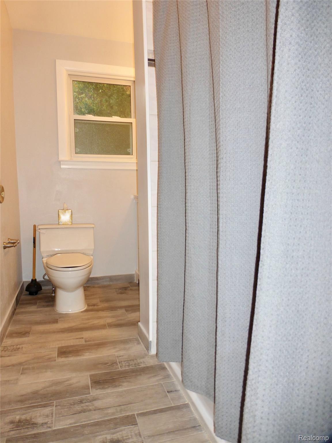7761 South Eston Road Clarkston, MI 48348 - Photo 13 of 31 Beautiful bathroom floors