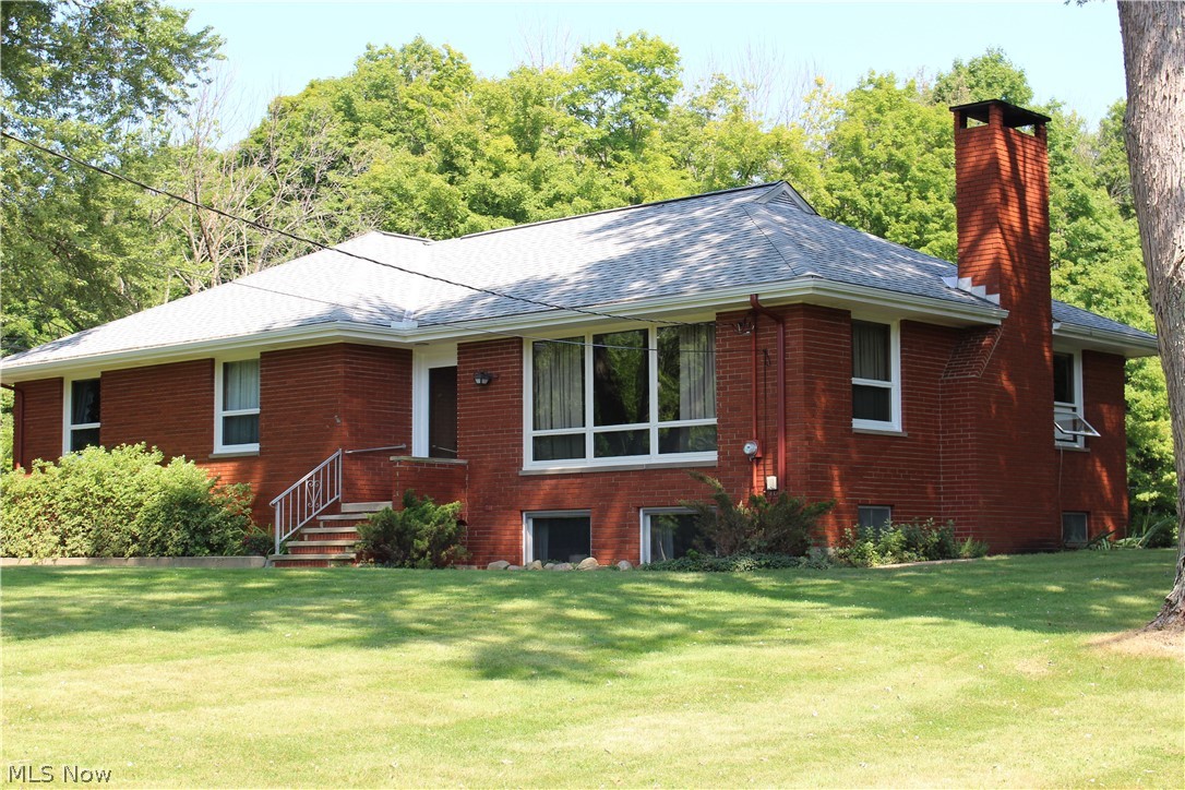 8818 Carnes Road Chagrin Falls, OH 44023 - Photo 25 of 30 Front and east side of the home.