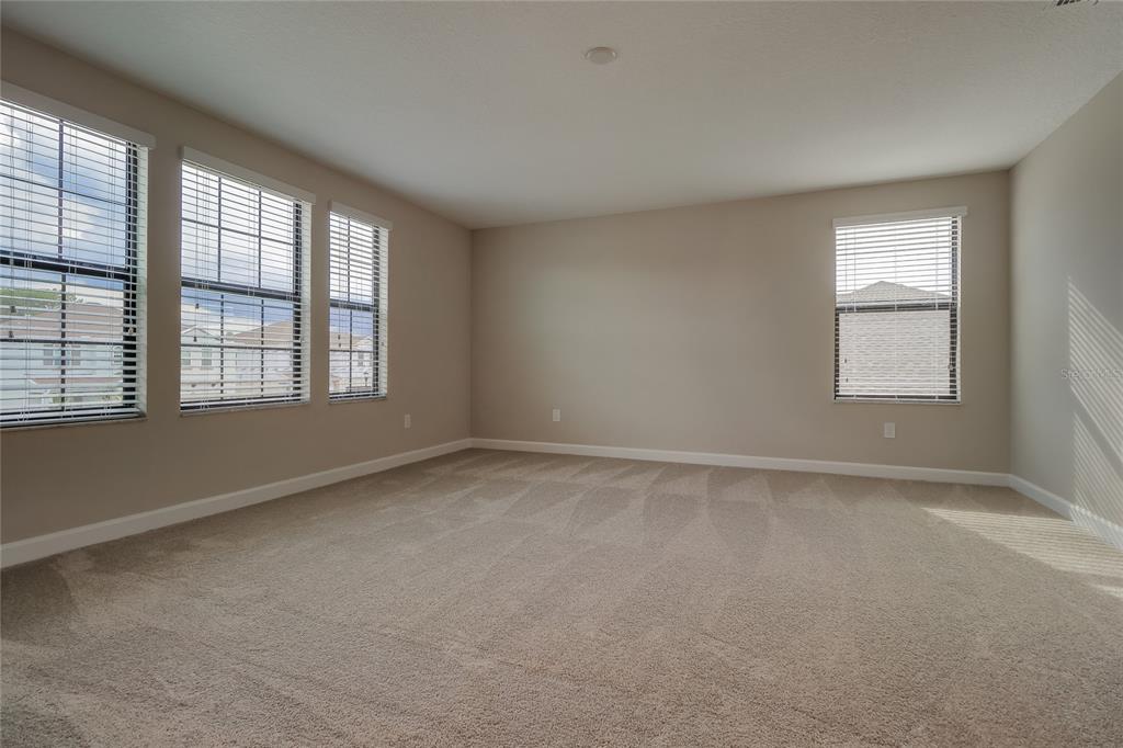 1172 Montgomery Bell Road Wesley Chapel, FL 33543 - Photo 17 of 47 an empty room with a window