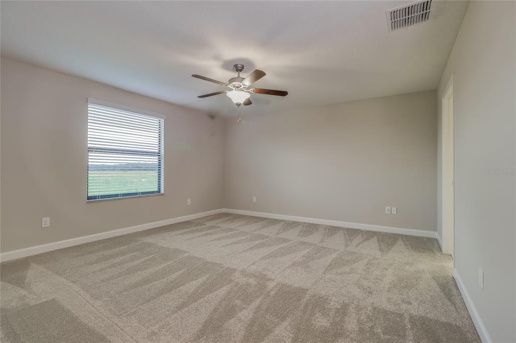 1172 Montgomery Bell Road Wesley Chapel, FL 33543 - Photo 20 of 47 a view of an empty room with a window