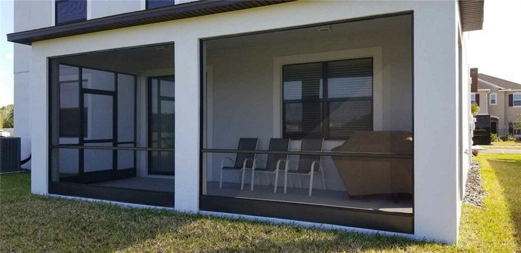 1172 Montgomery Bell Road Wesley Chapel, FL 33543 - Photo 37 of 47 a view of outdoor space deck and living room