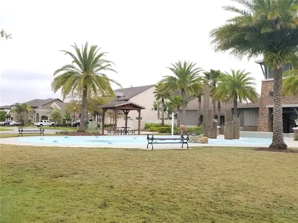 a view of outdoor space with swimming pool and patio
