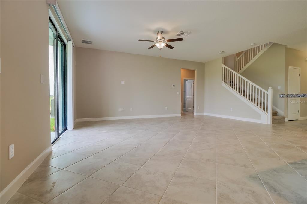 1172 Montgomery Bell Road Wesley Chapel, FL 33543 - Photo 9 of 47 a view of an empty room with a window