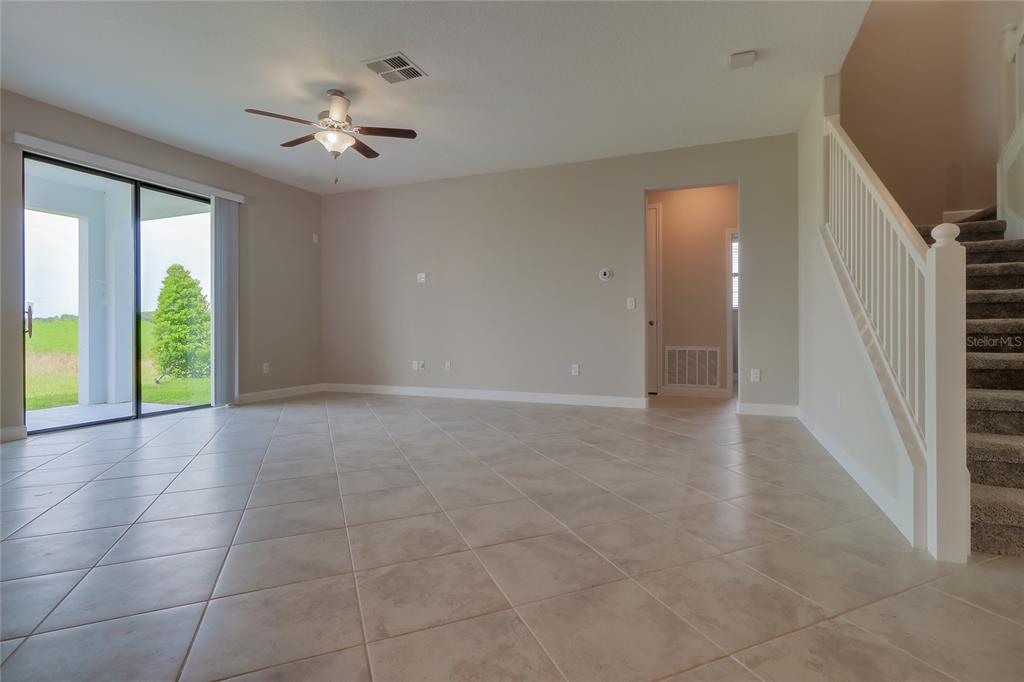 1172 Montgomery Bell Road Wesley Chapel, FL 33543 - Photo 10 of 47 a view of an empty room with a window