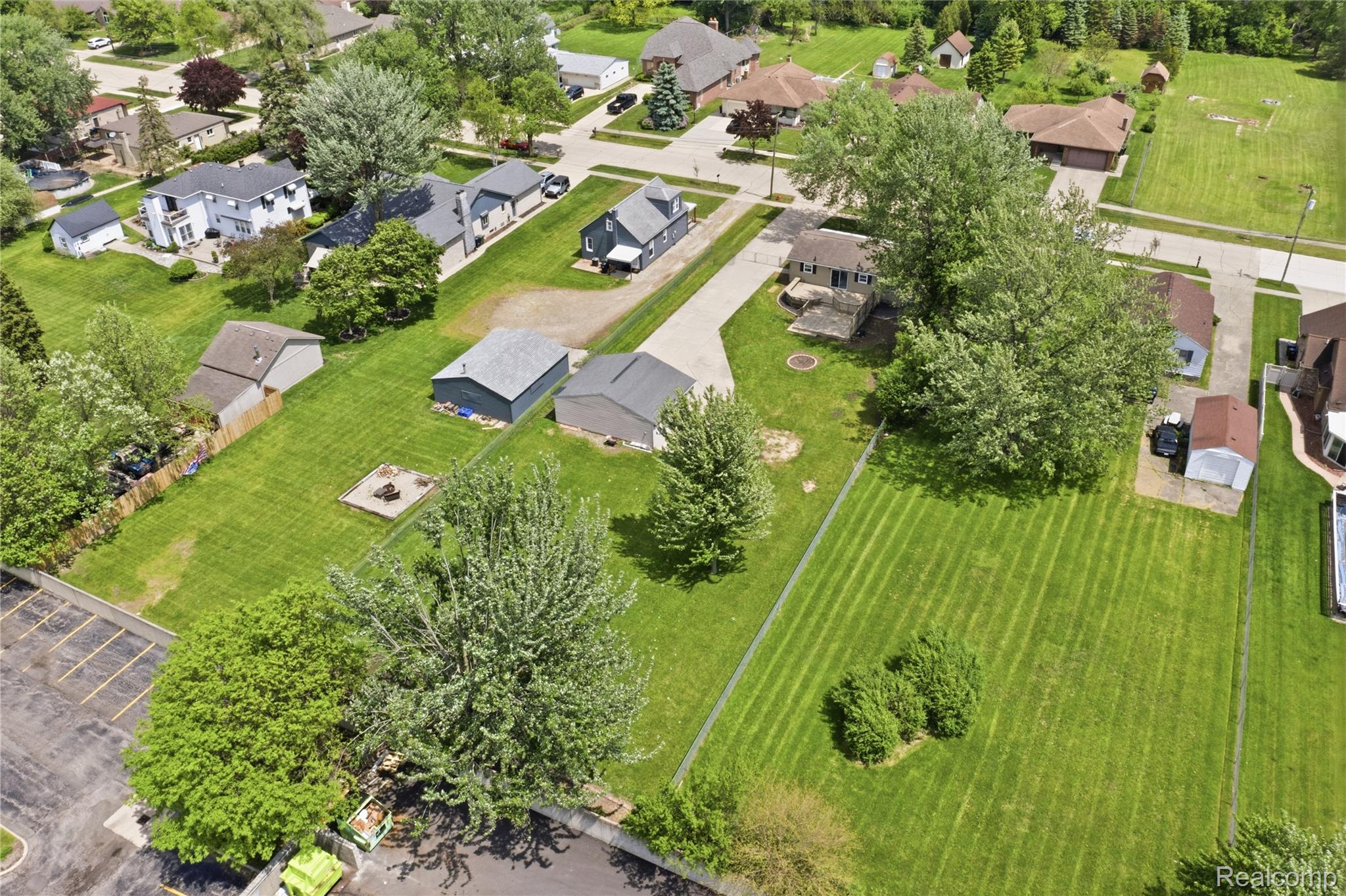37257 Dundee Street Sterling Heights, MI 48310 - Photo 47 of 47 Expansive green lot with established trees