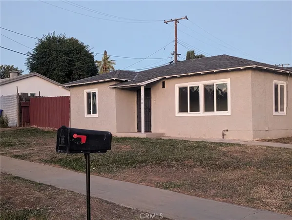 a front view of a house with street