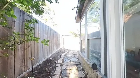 a view of a wooden fence