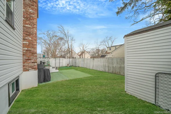 a view of a backyard with a small cabin