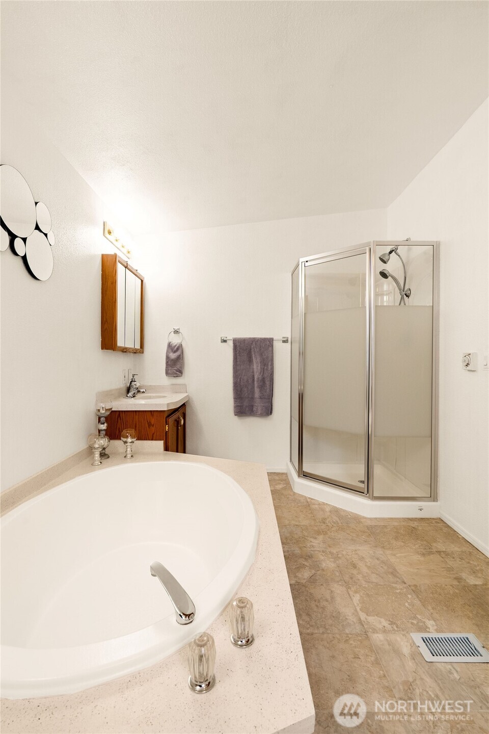 18000 Applegate Street Southwest Rochester, WA 98579 - Photo 11 of 40 a bathroom with a tub sink and mirror