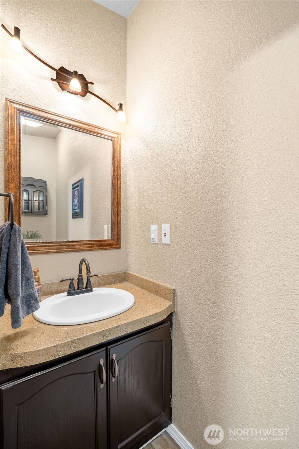 18000 Applegate Street Southwest Rochester, WA 98579 - Photo 18 of 40 a bathroom with a sink and a mirror